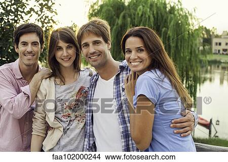 Friends posing for group photo View Large Photo Image Picture - Friends posing for group photo. Fotosearch
