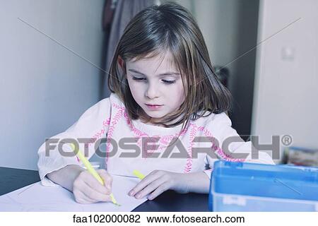 Girl writing in notebook View Large Photo Image Stock Image - Girl writing in notebook. Fotosearch