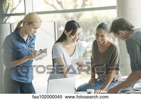 Group work fosters innovation View Large Photo Image Stock Photography - Group work fosters innovation. Fotosearch