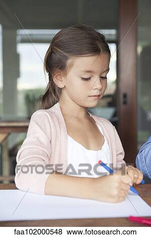 Stock Photo - Little girl drawing with felt tip pen. Fotosearch
