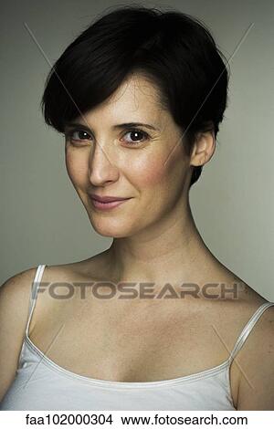 Picture - "Mid-adult woman, portrait". Fotosearch