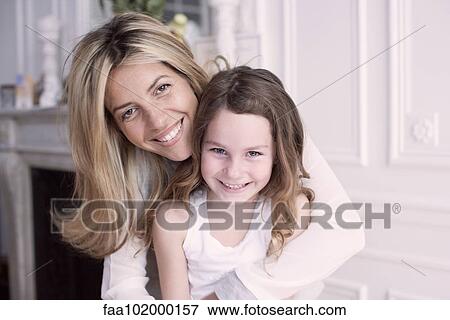 "Mother and daughter, portrait" View Large Photo Image Stock Photo - "Mother and daughter, portrait". Fotosearch