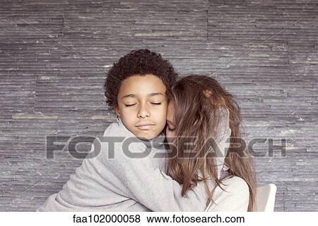 "Mother and young son embracing, portrait" View Large Photo Image Stock Photo - "Mother and young son embracing, portrait". Fotosearch