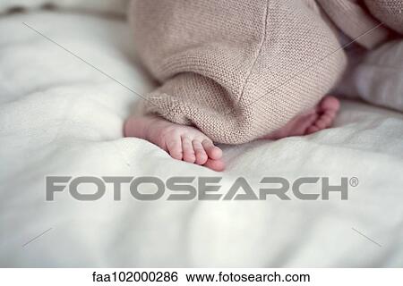Newborn baby's bare foot View Large Photo Image Stock Photograph - Newborn baby's bare foot. Fotosearch