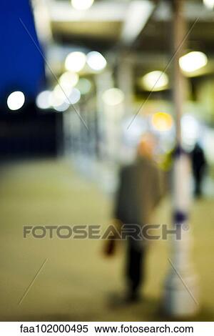 "Pedestrian walking at night, defocused" View Large Photo Image Stock Photography - "Pedestrian walking at night, defocused". Fotosearch