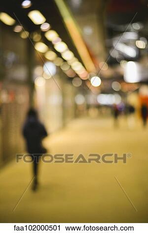 "Pedestrian walking on sidewalk at night, defocused" View Large Photo Image Stock Image - "Pedestrian walking on sidewalk at night, defocused". Fotosearch