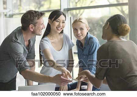Project team working together View Large Photo Image Stock Image - Project team working together. Fotosearch