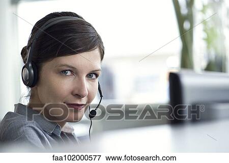 Stock Photo - "Receptionist, portrait". Fotosearch