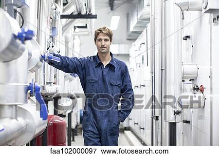 "Skilled worker in industrial plant, portrait" View Large Photo Image Stock Photo - "Skilled worker in industrial plant, portrait". Fotosearch