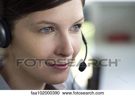 Stock Image - "Telemarketer, portrait". Fotosearch