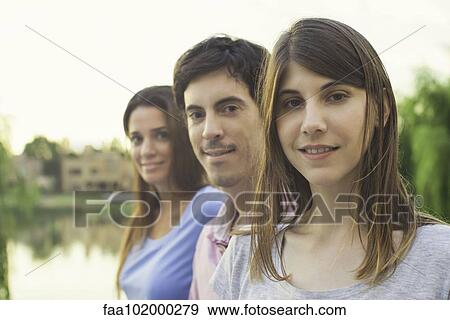 Tourists together at scenic location View Large Photo Image Stock Photo - Tourists together at scenic location. Fotosearch