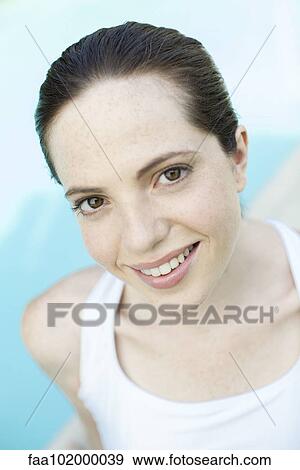 "Young woman smiling cheerfully, portrait" View Large Photo Image Stock Photo - "Young woman smiling cheerfully, portrait". Fotosearch