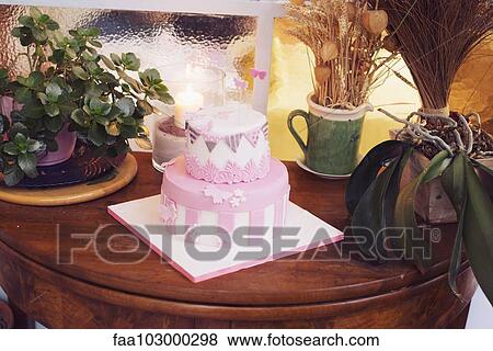 Stock Photo - Birthday cake decorated with fondant butterflies. Fotosearch