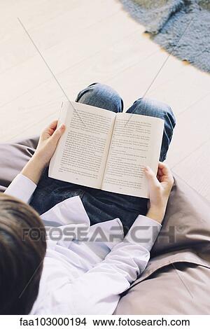 Picture - Boy reading book. Fotosearch