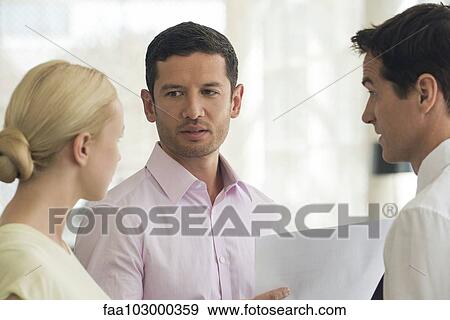 Business colleagues brainstorming View Large Photo Image Stock Photo - Business colleagues brainstorming. Fotosearch