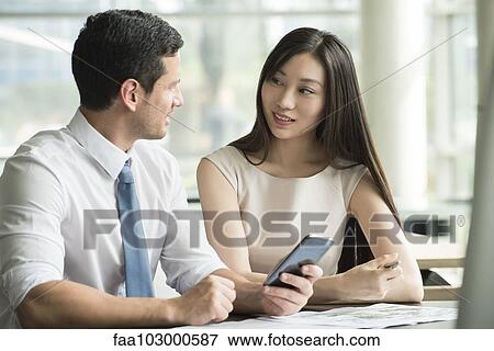 Business colleagues working together View Large Photo Image Stock Photo - Business colleagues working together. Fotosearch
