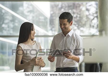 Business professionals brainstorming View Large Photo Image Stock Photograph - Business professionals brainstorming. Fotosearch