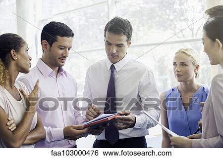 Business professionals brainstorming View Large Photo Image Stock Photograph - Business professionals brainstorming. Fotosearch