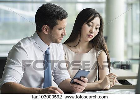 Business professionals working together View Large Photo Image Stock Image - Business professionals working together. Fotosearch