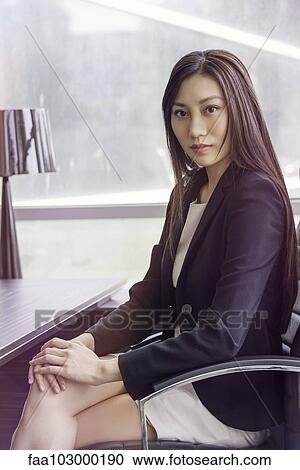 "Business woman at desk, portrait" View Large Photo Image Stock Image - "Business woman at desk, portrait". Fotosearch