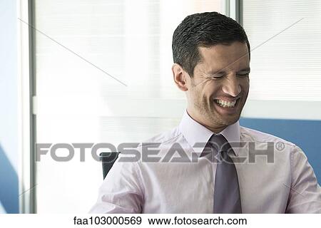 "Businessman in office, portrait" View Large Photo Image Stock Photo - "Businessman in office, portrait". Fotosearch