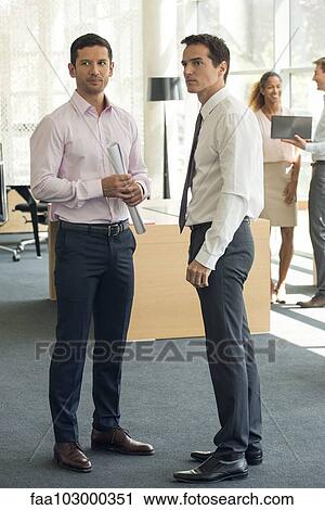 Businessmen gossipping View Large Photo Image Stock Image - Businessmen gossipping. Fotosearch