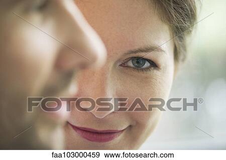 "Close-up of couple, woman smiling at camera" View Large Photo Image Stock Photo - "Close-up of couple, woman smiling at camera". Fotosearch