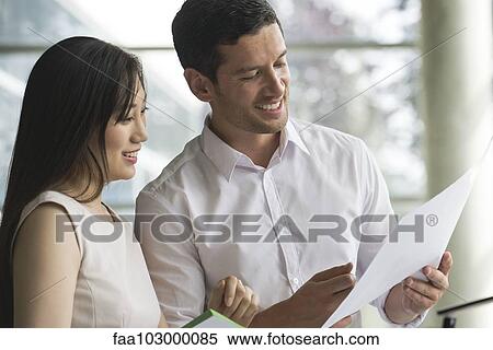 Colleagues collaborating View Large Photo Image Stock Photography - Colleagues collaborating. Fotosearch