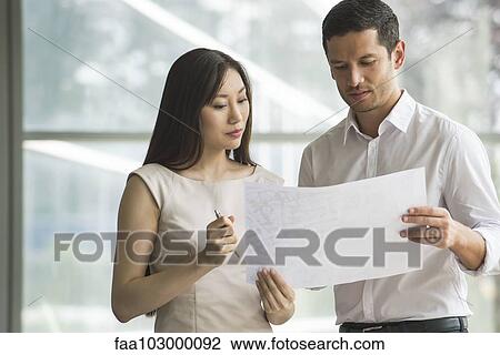 Colleagues working together View Large Photo Image Stock Image - Colleagues working together. Fotosearch