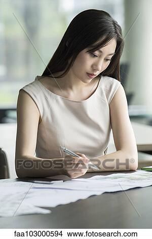 College student taking exam View Large Photo Image Picture - College student taking exam. Fotosearch