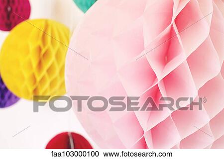 Stock Image - Colorful tissue paper pompoms. Fotosearch