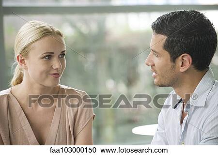 Couple chatting View Large Photo Image Stock Image - Couple chatting. Fotosearch