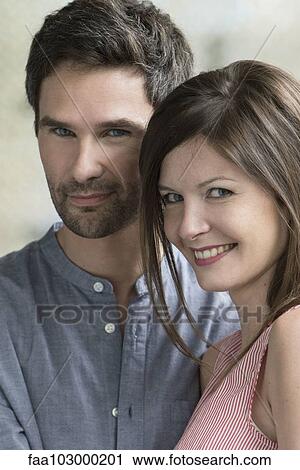 "Couple cheek to cheek, portrait" View Large Photo Image Stock Image - "Couple cheek to cheek, portrait". Fotosearch
