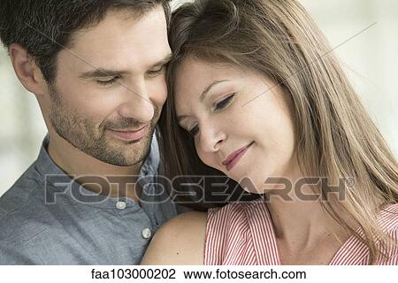 "Couple embracing, portrait" View Large Photo Image Stock Image - "Couple embracing, portrait". Fotosearch