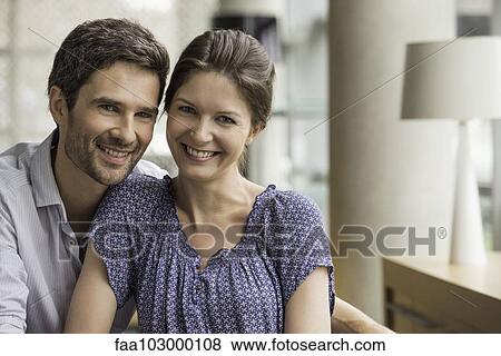 "Couple smiling together at home, portrait" View Large Photo Image Stock Photo - "Couple smiling together at home, portrait". Fotosearch