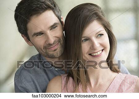 "Couple smiling together, portrait" View Large Photo Image Picture - "Couple smiling together, portrait". Fotosearch