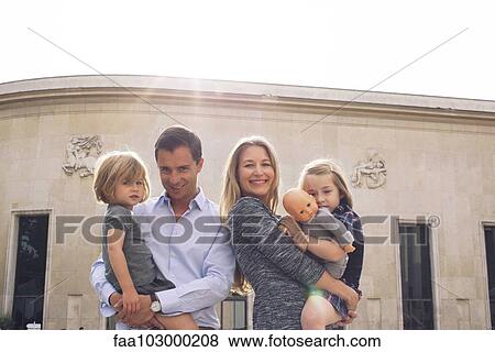"Family together outdoors, portrait" View Large Photo Image Stock Photo - "Family together outdoors, portrait". Fotosearch