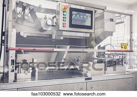 Industrial pill packing machinery View Large Photo Image Stock Image - Industrial pill packing machinery. Fotosearch
