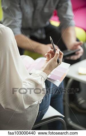 "Interior decorator discussing color swatches, cropped" View Large Photo Image Stock Image - "Interior decorator discussing color swatches, cropped". Fotosearch