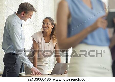 Laptops and digital tablets make collaboration in the office easy View Large Photo Image Stock Photography - Laptops and digital tablets make collaboration in the office easy. Fotosearch