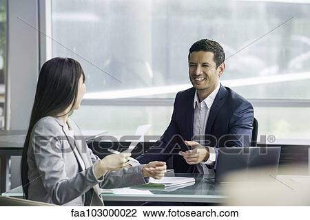 Lawyer reviewing document with client View Large Photo Image Stock Image - Lawyer reviewing document with client. Fotosearch