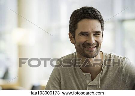"Man smiling cheerfully, portrait" View Large Photo Image Stock Image - "Man smiling cheerfully, portrait". Fotosearch