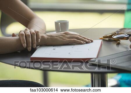 "Meeting for coffee, dayplaner on table" View Large Photo Image Picture - "Meeting for coffee, dayplaner on table". Fotosearch