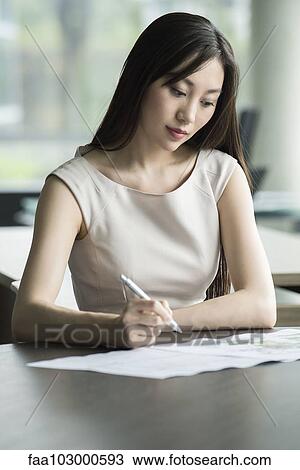 Office worker doing paperwork View Large Photo Image Stock Image - Office worker doing paperwork. Fotosearch