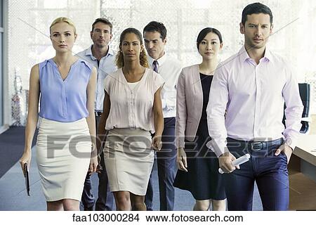 Officer workers marching in unison View Large Photo Image Picture - Officer workers marching in unison. Fotosearch
