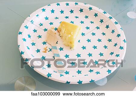 Partially eaten piece of cake on festive paper plate View Large Photo Image Stock Photo - Partially eaten piece of cake on festive paper plate. Fotosearch
