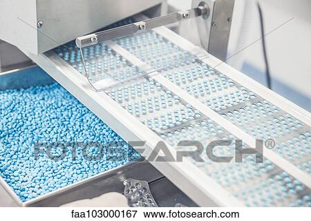 Pill packaging machinery View Large Photo Image Stock Photo - Pill packaging machinery. Fotosearch