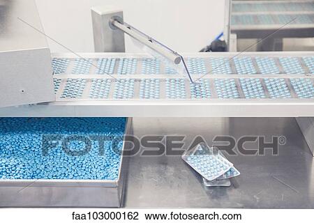 Pills on conveyor belt entering blisterpack sealing machine View Large Photo Image Stock Image - Pills on conveyor belt entering blisterpack sealing machine. Fotosearch