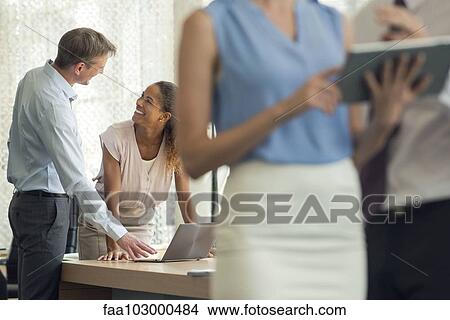 Professional collaboration can be fun View Large Photo Image Picture - Professional collaboration can be fun. Fotosearch