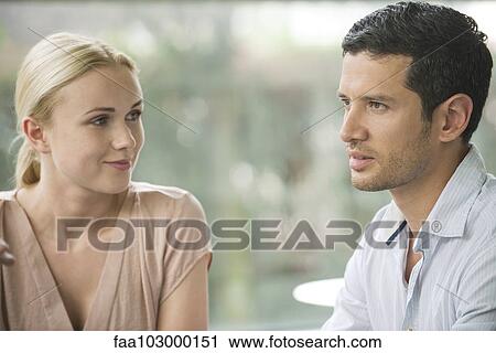 Woman admiring male companion View Large Photo Image Stock Image - Woman admiring male companion. Fotosearch